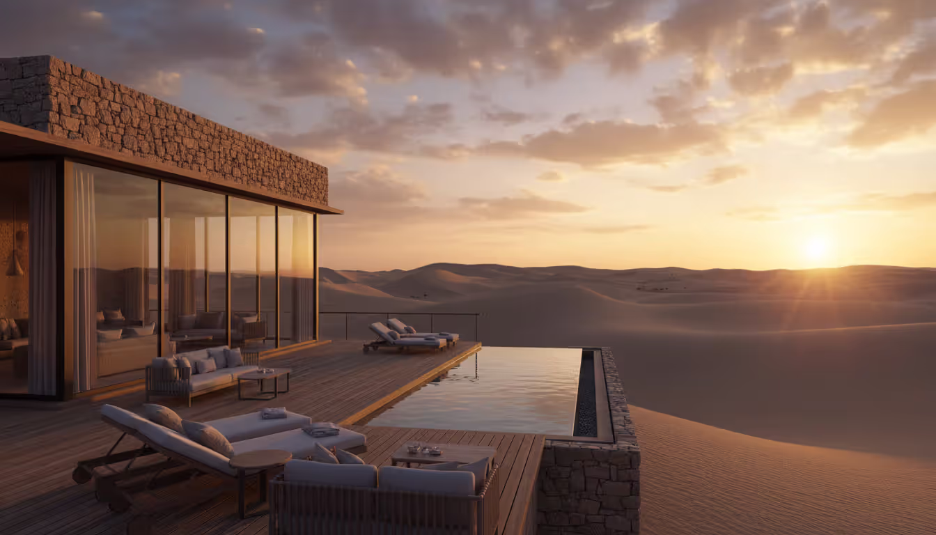 Luxury stone-and-glass desert safari lodge with private pool on elevated platform overlooking Namibian sand dunes at golden hour